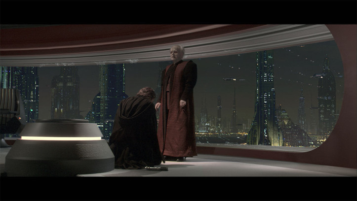 Anakin kniet vor Palpatine nieder, der seinem Schüler einen neuen Namen gibt: Darth Vader.