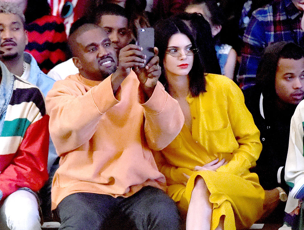 LOS ANGELES, CA - JUNE 11: Hip hop artist/designer/producer Kanye West (L) and model Kendall Jenner attend Tyler, the Creator's fashion show for Made LA at L.A. Live on June 11, 2016 in Los Angeles, California. (Photo by Kevin Winter/Getty Images)