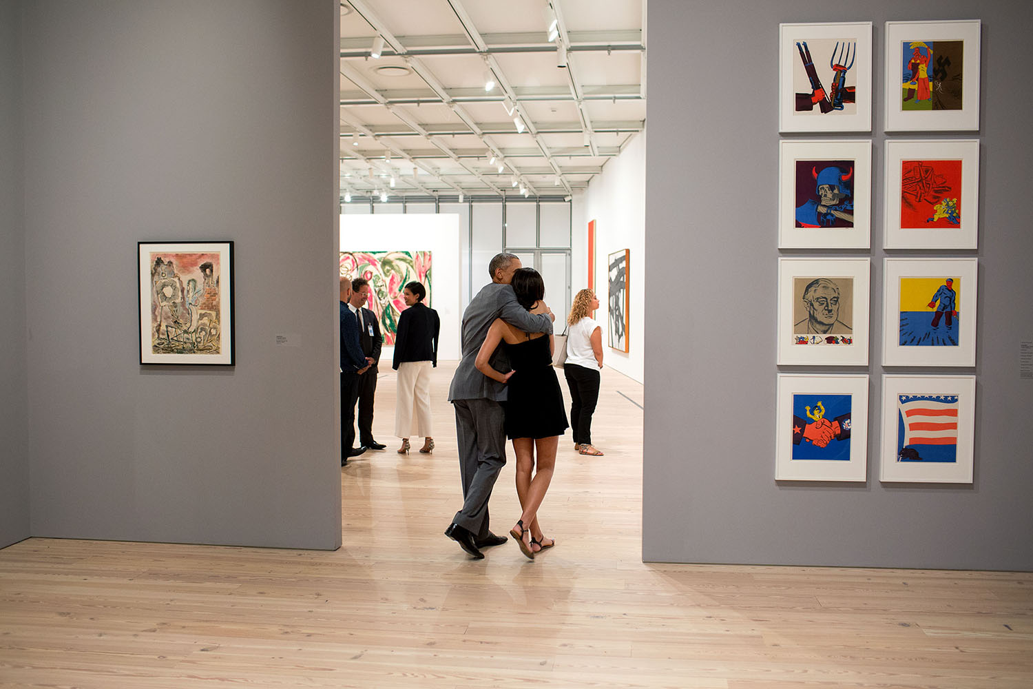 July 17, 2015 "While visiting the Whitney Museum in New York City, the President hugged his daughter Malia as they looked at the art work." (Official White House Photo by Pete Souza) This official White House photograph is being made available only for publication by news organizations and/or for personal use printing by the subject(s) of the photograph. The photograph may not be manipulated in any way and may not be used in commercial or political materials, advertisements, emails, products, promotions that in any way suggests approval or endorsement of the President, the First Family, or the White House.