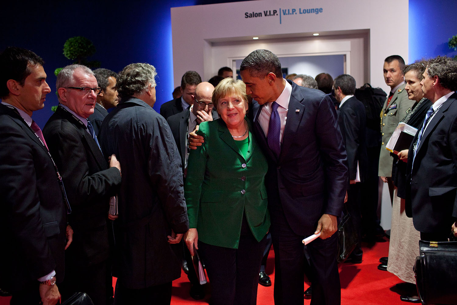 Nov. 3, 2011 "After a meeting with Eurozone leaders adjacent to the G20 Summit in Cannes, France, the President gave encouragement to German Chancellor Angela Merkel as they departed the meeting." (Official White House Photo by Pete Souza) This official White House photograph is being made available only for publication by news organizations and/or for personal use printing by the subject(s) of the photograph. The photograph may not be manipulated in any way and may not be used in commercial or political materials, advertisements, emails, products, promotions that in any way suggests approval or endorsement of the President, the First Family, or the White House.