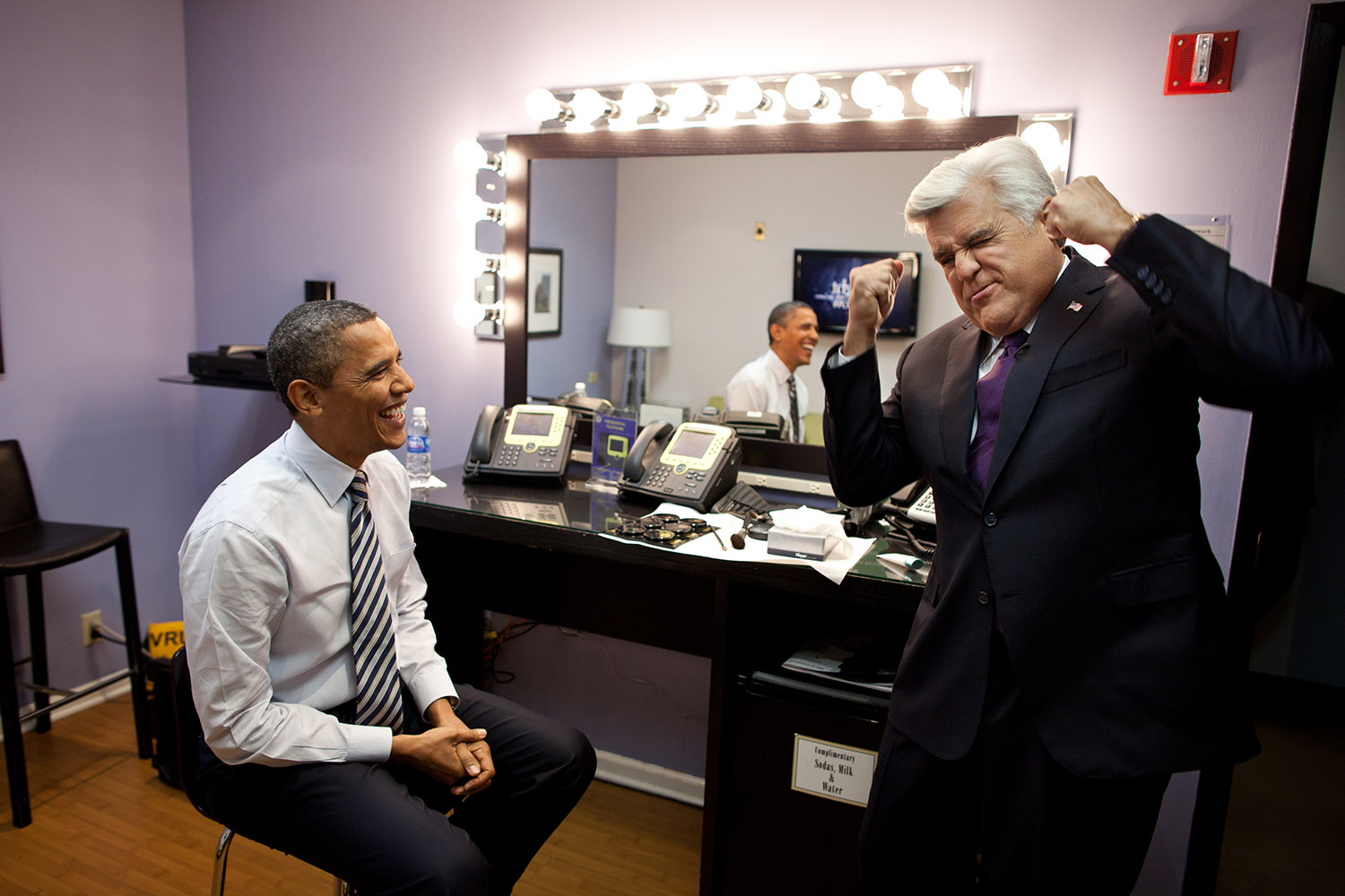 Oct. 25, 2011 "Even backstage, Jay Leno is a hoot. Here he tells the punch line to a funny story as the President waits to tape the Tonight Show in Burbank, Calif." (Official White House Photo by Pete Souza) This official White House photograph is being made available only for publication by news organizations and/or for personal use printing by the subject(s) of the photograph. The photograph may not be manipulated in any way and may not be used in commercial or political materials, advertisements, emails, products, promotions that in any way suggests approval or endorsement of the President, the First Family, or the White House.