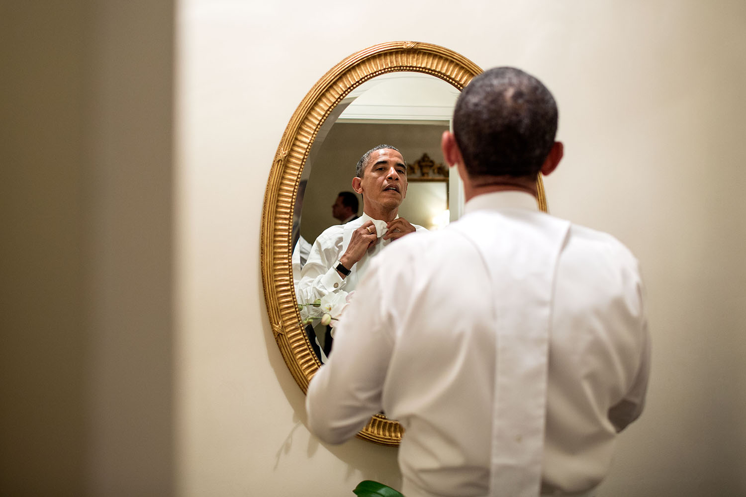 Oct. 18, 2012 "The President ties his white tie before the Alfred E. Smith dinner in New York. Although the dinner is an annual event, every four years, the two presidential nominees attend the dinner only a few weeks before the election." (Official White House Photo by Pete Souza) This official White House photograph is being made available only for publication by news organizations and/or for personal use printing by the subject(s) of the photograph. The photograph may not be manipulated in any way and may not be used in commercial or political materials, advertisements, emails, products, promotions that in any way suggests approval or endorsement of the President, the First Family, or the White House.
