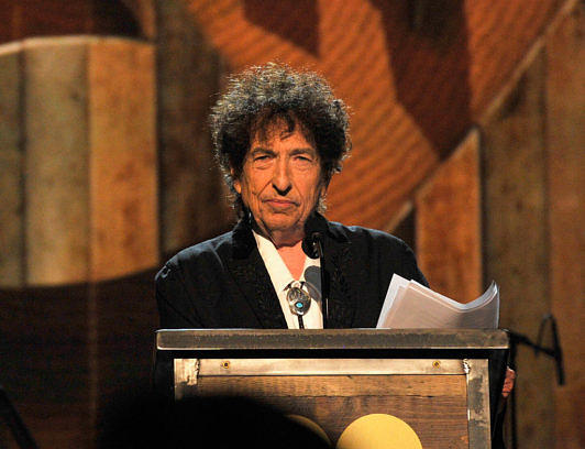 LOS ANGELES, CA - FEBRUARY 06: Honoree Bob Dylan speaks onstage at the 25th anniversary MusiCares 2015 Person Of The Year Gala honoring Bob Dylan at the Los Angeles Convention Center on February 6, 2015 in Los Angeles, California. The annual benefit raises critical funds for MusiCares' Emergency Financial Assistance and Addiction Recovery programs. For more information visit musicares.org. (Photo by Lester Cohen/WireImage)