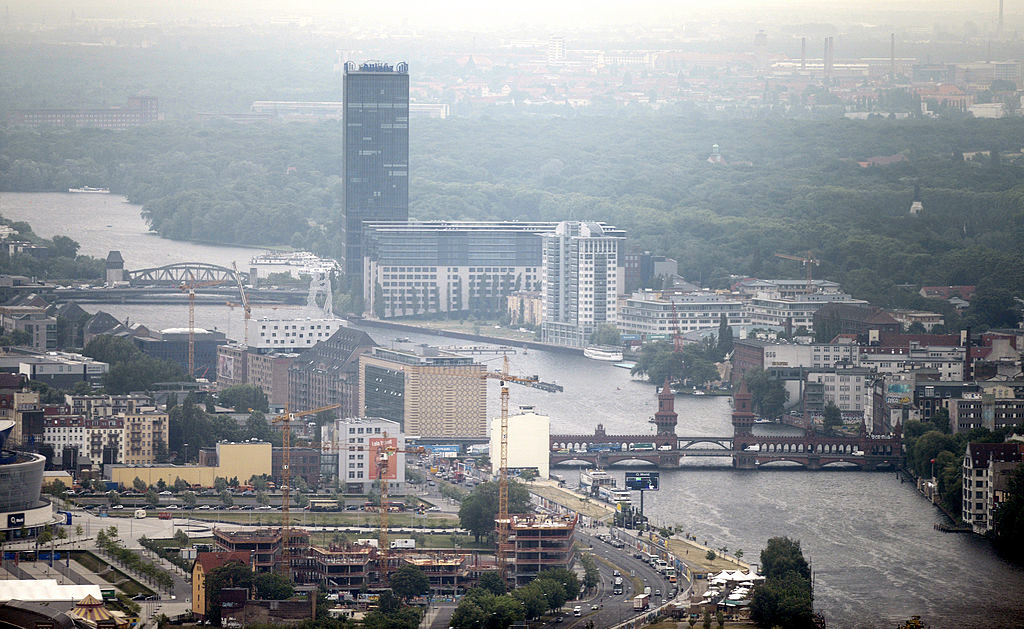 An aerial view taken on May 29, 2012 shows the Oberbaum Bruecke bridge (R) over the Spree river through the Friedrichshain...