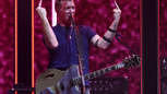INGLEWOOD, CA - DECEMBER 09: (EDITORS NOTE: Image contains profanity.) Josh Homme of Queens of the Stone Age performs onst...