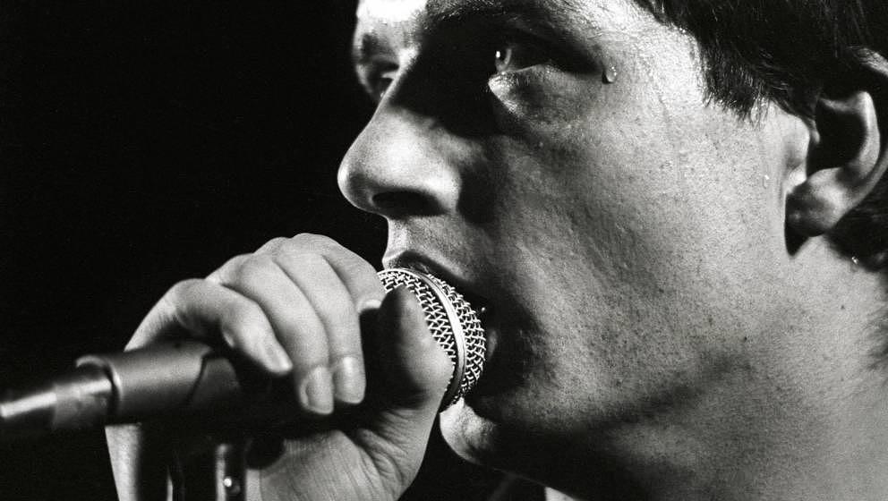 NETHERLANDS - JANUARY 16:  ROTTERDAM  Photo of Joy Division, Ian Curtis performing live onstage at the Lantaren  (Photo by Ro