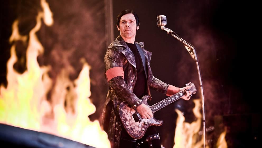 The German industrial metal band Rammstein performs a live concert at Copenhagen Live 2010 at Tioren. Here the bands guitaris