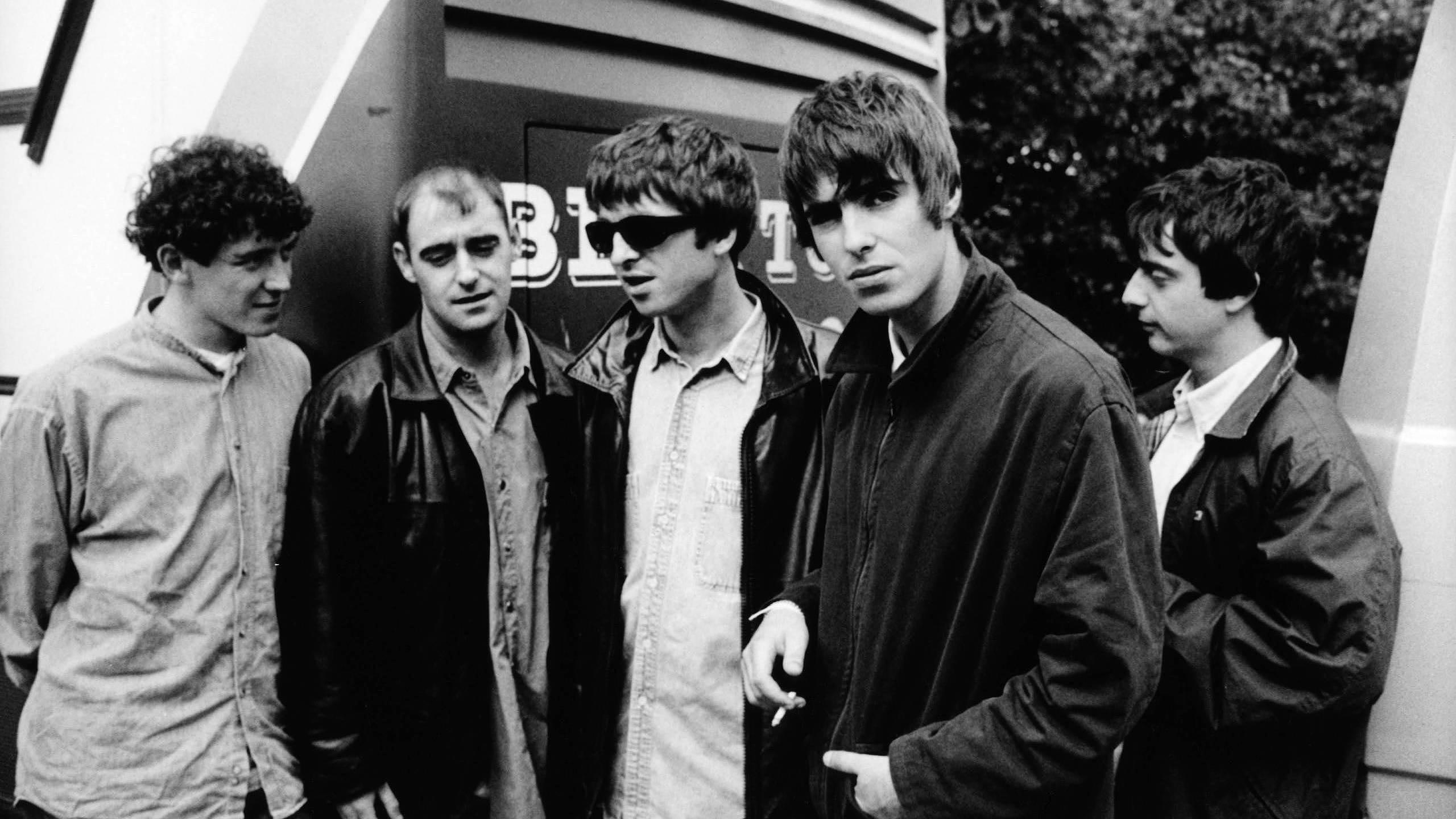 Oasis 1994: Tony McCarroll, Paul 'Bonehead' Arthurs, Noel Gallagher, Liam Gallagher, Paul 'Guigsy' McGuigan