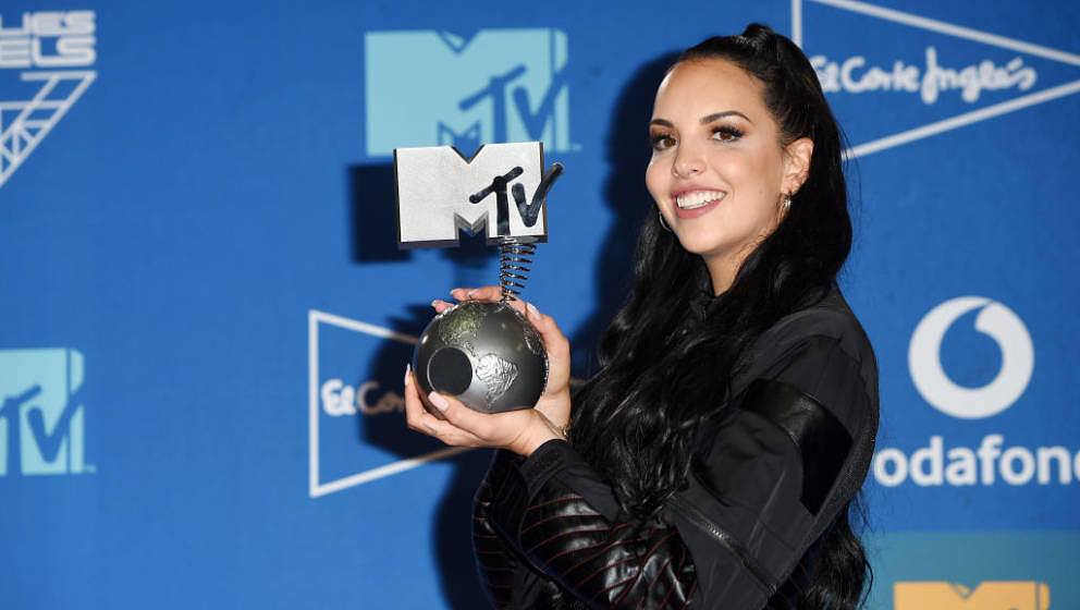SEVILLE, SPAIN - NOVEMBER 03: Juju poses with Best German Act Award in the winners room during the MTV EMAs 2019 at FIBES Con