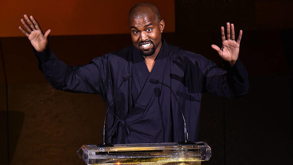 NEW YORK, NY - JUNE 01:  Kanye West presents the Fashion Icon Award to Pharrell Williams onstage at the 2015 CFDA Fashion Awa