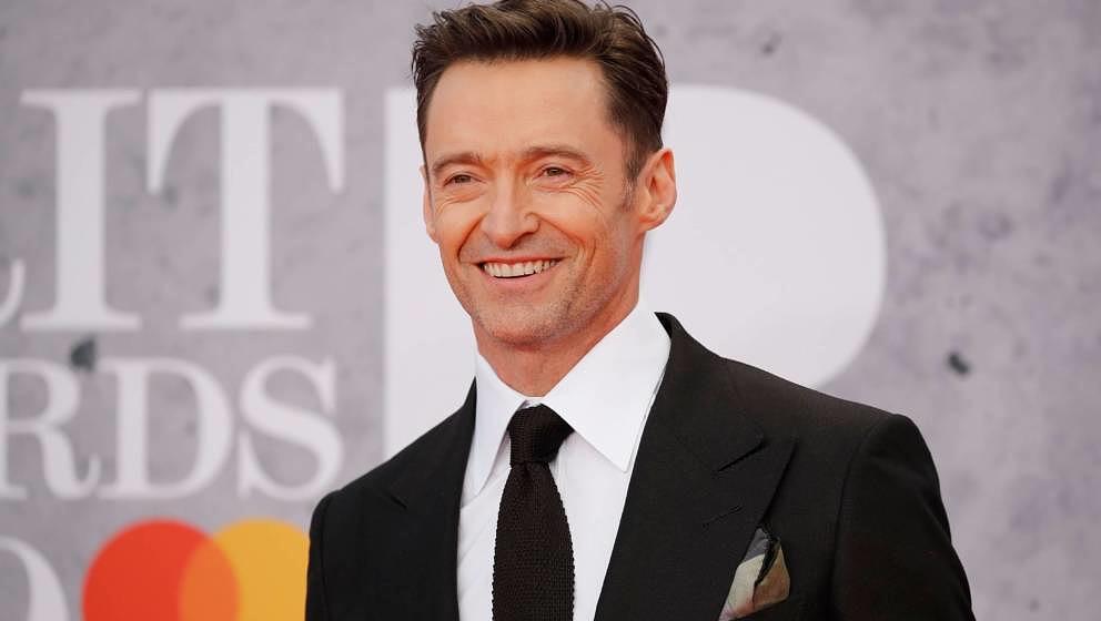 Australian actor Hugh Jackman poses on the red carpet on arrival for the BRIT Awards 2019 in London on February 20, 2019. (Ph