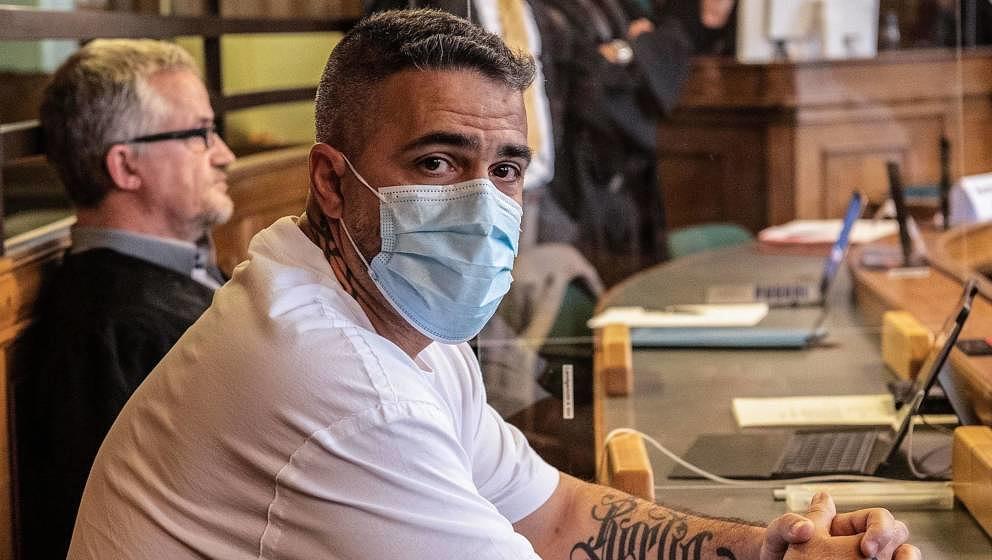 Plaintiff Anis Mohamed Youssef Ferchichi, known as German rapper Bushido sits in the courtroom ahead the beginning of a trial