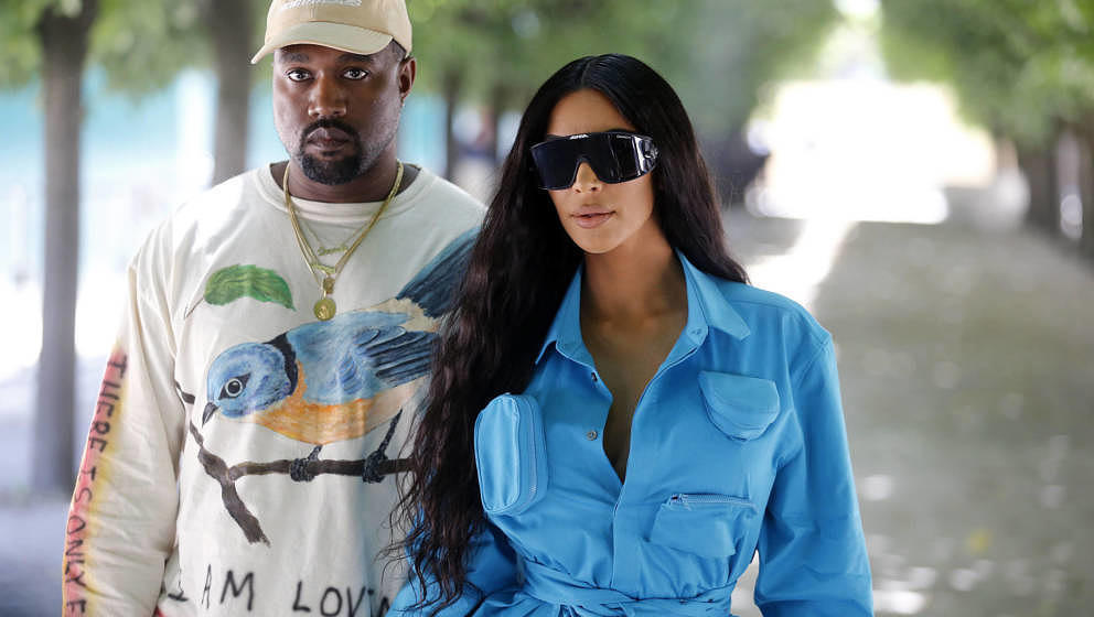PARIS, FRANCE - JUNE 21:  Kanye West and Kim Kardashian attend the Louis Vuitton Menswear Spring/Summer 2019 show as part of 