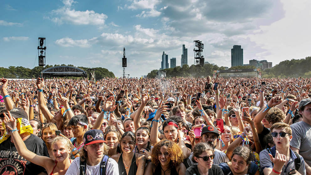 CHICAGO, ILLINOIS - JULY 31: Festival-goers attend day 3 of Lollapalooza at Grant Park on July 30, 2021 in Chicago, Illinois.