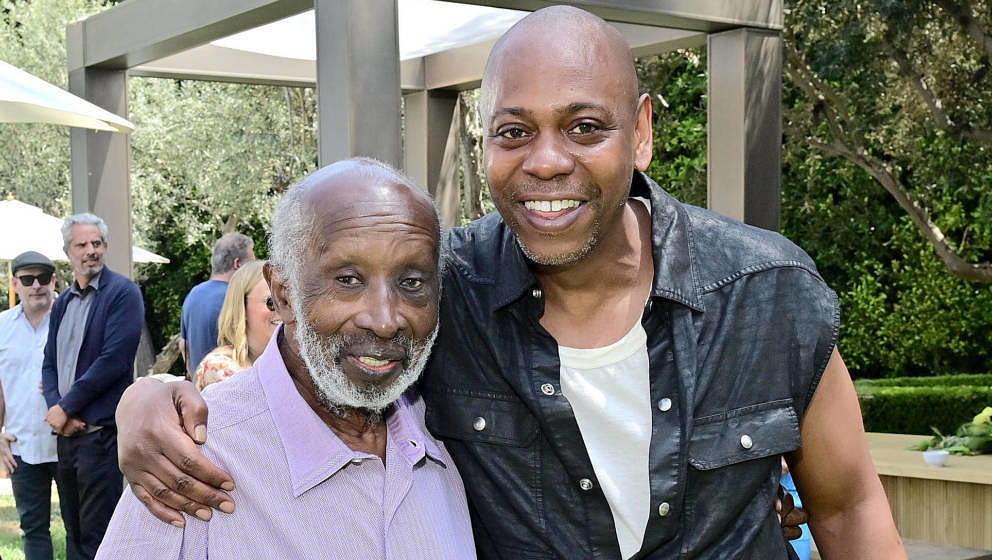 LOS ANGELES, CALIFORNIA - MAY 01: (L-R) Clarence Avant and Dave Chappelle attend NETFLIX IS A JOKE PRESENTS - Ted's Brunch on