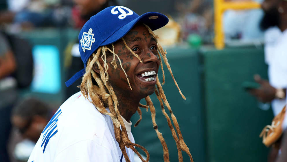 LOS ANGELES, CALIFORNIA - JULY 17: Lil Wayne plays softball at the Bumpboxx Honors 75th Anniversary Of Jackie Robinson Breaki