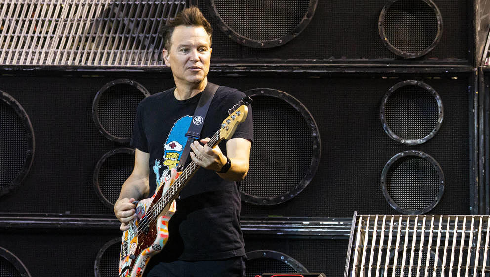 CLARKSTON, MICHIGAN - SEPTEMBER 10: Mark Hoppus of Blink-182 performs at DTE Energy Music Theater on September 10, 2019 in Cl