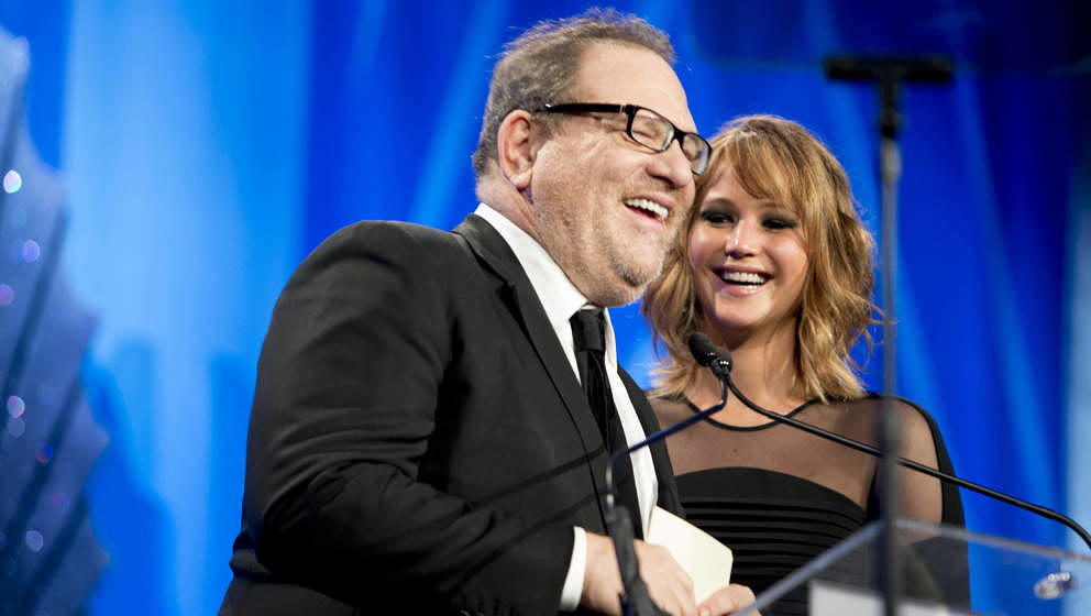 LOS ANGELES, CA - APRIL 20: Producer Harvey Weinstein (L) and actress Jennifer Lawrence speak onstage during the 24th Annual 