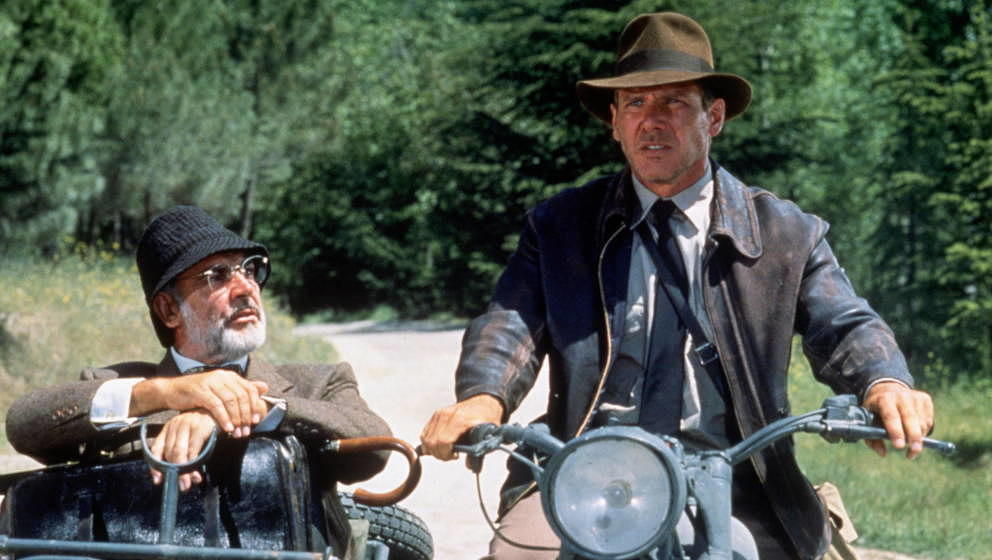 American actor Harrison Ford as the eponymous archaeologist and Scottish actor Sean Connery as his father Henry Jones during 
