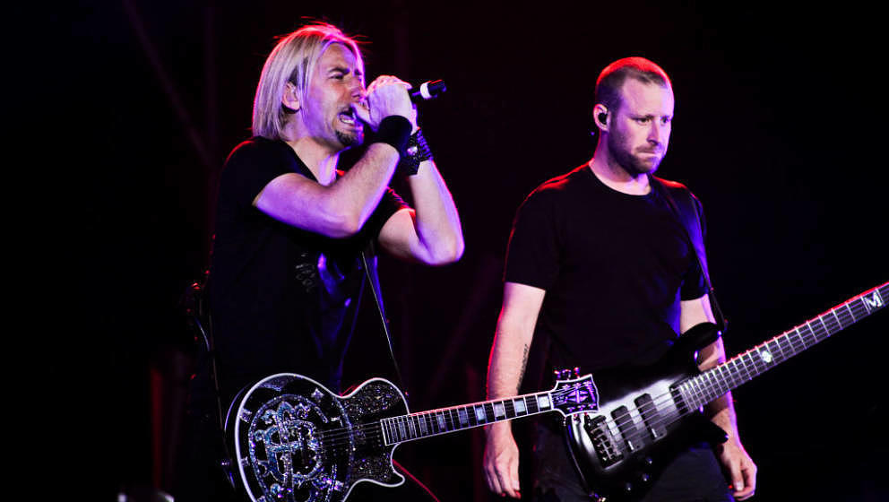 LONDON, UNITED KINGDOM - MAY 28: Chad Kroeger and Mike Kroeger of Nickelback perform on stage at the O2 Arena on May 28, 2009